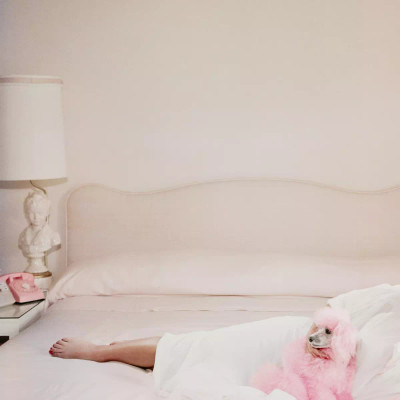 Four Hands Joan Collins Relaxes by Slim Aarons - 24"X24"