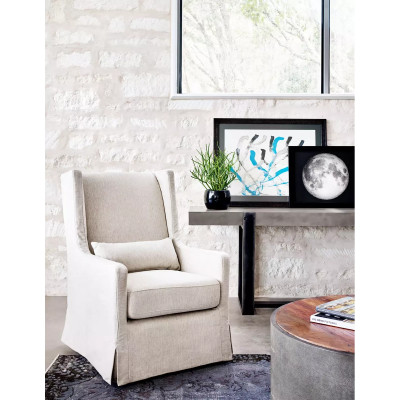 Four Hands Swivel Wing Chair