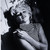 Four Hands Marilyn Monroe Relaxing By Getty Images - 18X24"