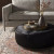 Four Hands Sinclair Large Round Ottoman - Black Hair On Hide