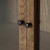 Four Hands Millie Panel and Glass Door Double Cabinet - Drifted Oak Solid (Closeout)
