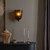 Amber Lewis x Four Hands Cerie Sconce - Amber Hammered Glass