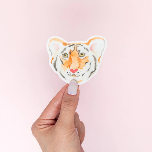 Tiger Sticker by Kathy Phan
Sticker size: 2.54" x 3"

This sticker is durable and waterproof. Show what you love on your laptop, water bottle, or anything!
Printed in USA