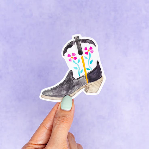 This fiesta floral black and white Texas cowboy boot vinyl magnet was created using a hand painted watercolor illustration of a cowboy boot by Kathy Phan from kathyphantastic. Bring back memories from Fiesta at the San Antonio Riverwalk.