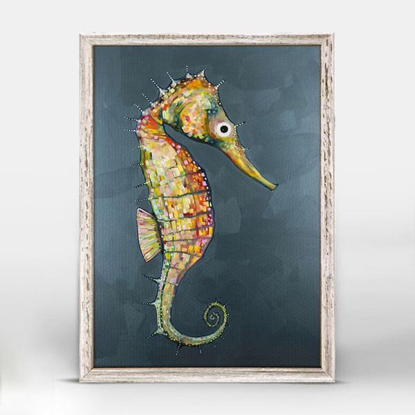 Floating Seahorse in Blue Mini Framed Canvas Print by Eli Halpin