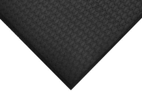 close up image of corner of black Cushion Select mat. Mat has diamond pattern surface across the top and beveled edges. close up image of corner of black Cushion Select mat. Mat has diamond pattern surface across the top and beveled edges.