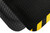 Corner of Black Hog Heaven mat with another black Hog Heaven mat with yellow border on top. Both mats have slanted edges and are thicker in the center and have a diamond patterned surface.