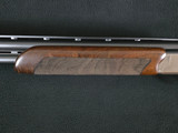 Browning 825 Sporting 12ga 32" Adj Comb- Ref# 4458 Browning 825 Sporting 12ga 32" Adj Comb- Ref# 4458