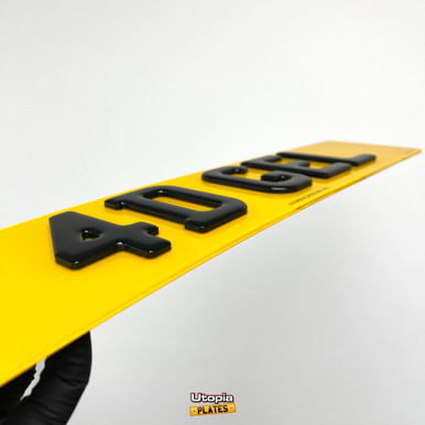 Detailed image of a 4D 3mm number plate with Gel, highlighting the striking contrast between the black acrylic base and the shiny 3D resin overlay, offering a sophisticated and eye-catching design.