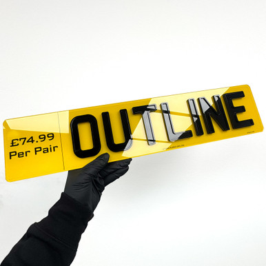 3D gel number plate held at an angle, showing raised domed lettering on a yellow rear number plate