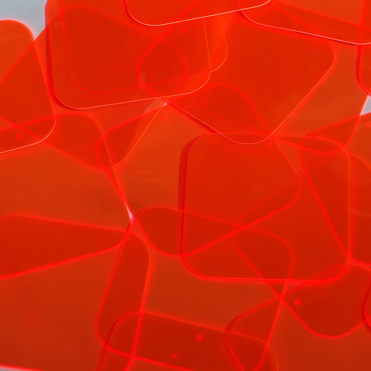 Go Go Red Transparent Vinyl Fluorescent Edge Glow Sequin Material -  SequinsUSA