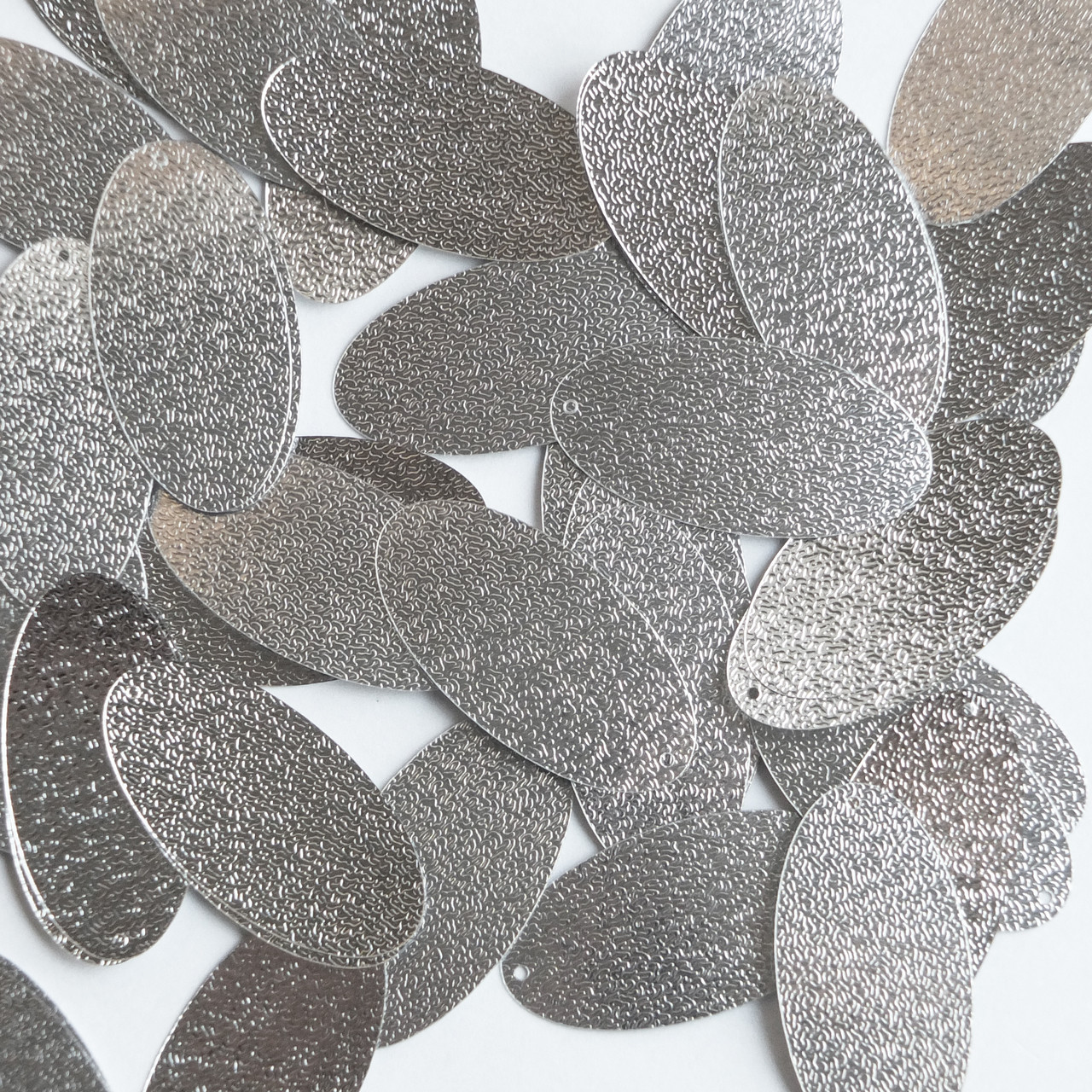 Oval Sequin 1.5" Silver Metallic Embossed Texture