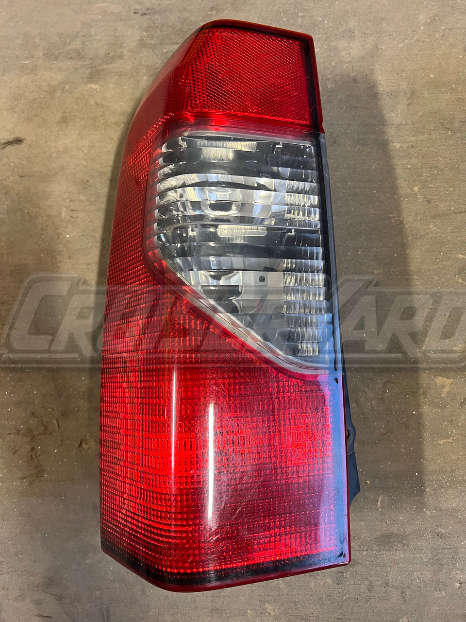 Nissan Xterra 2002-2004 Genuine Left Tail Light 935-700-03