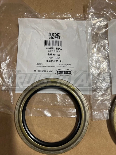 New Toyota Land Cruiser Pair of 2 OEM NOK Front Axle Wheel Seal 90311-70011