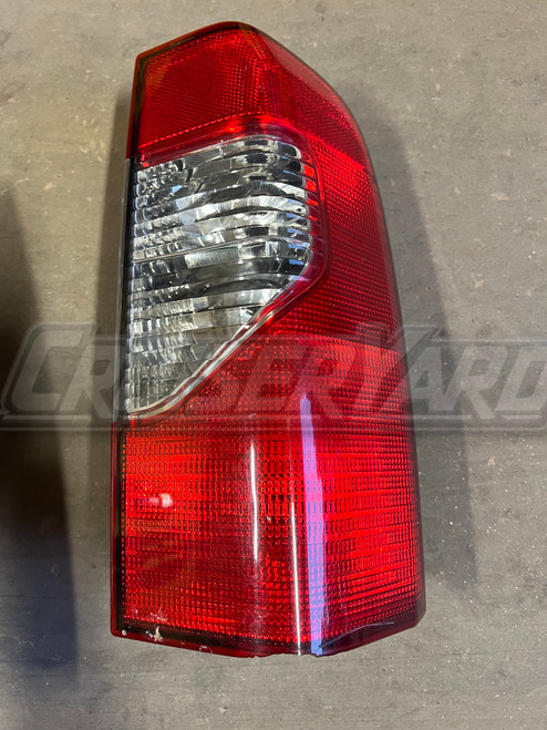 Nissan Xterra 2002-2004 Genuine Left Tail Light 935-700-03