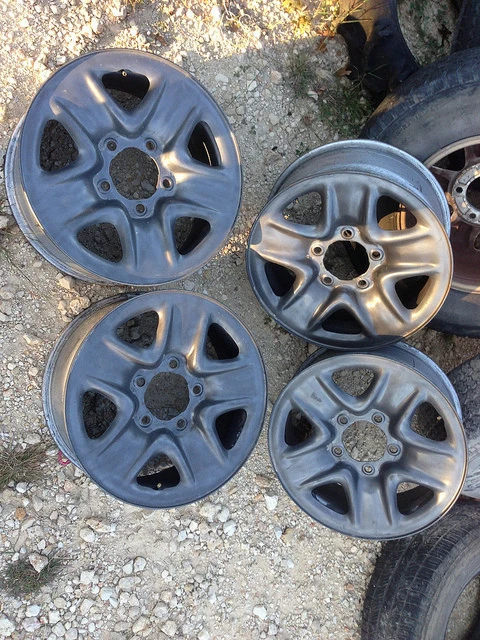 Four (4) OEM tundra 18x8 steel wheels painted graphite mica