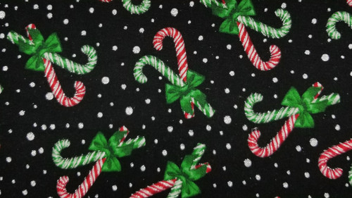 Large Candy Cane Sparkles on Black Background with Silver Dots