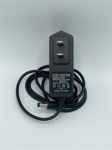 Black AC/DC adapter for Solum Gateway with 5V 2A output and attached power cable.