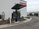 Outdoor drive-thru menu board installation featuring a double 55-inch LG XE4 display for 24x7 customer engagement.