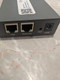 Side view of the WAND Gateway showing the LAN and WAN Ethernet ports, reset button, and power input.