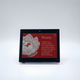A digital smart label on a stand showing an informational card about Peony flowers.