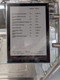 A digital nutrition information display listing calorie counts and portions for salad dressings and toppings.