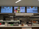 A triple-screen digital menu board configuration utilizing professional commercial displays, designed for seamless content synchronization, improved visual clarity, and enhanced promotional impact in modern dining environments.