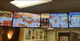 A multi-screen digital menu board configuration utilizing professional commercial displays, designed for seamless content synchronization, improved visual clarity, and enhanced promotional impact in modern dining environments.