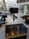 Professional commercial checkout counter featuring a 10-inch CM30 Chrome OS touch screen display.