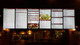 An 86" LG Lite Duty Smart Screen displaying a large, comprehensive restaurant menu board with diverse food categories.