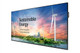 Perspective view of the 105 inch Ultra Stretch display presenting sustainable energy data in a professional setting.
