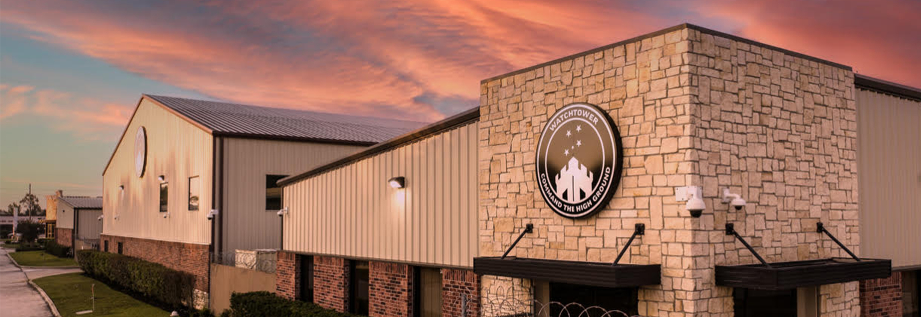 Watchtower Firearms facility at sunset