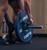 Eleiko Oppen Barbell Collars with an athlete using a loaded barbell secured with the collars during training
