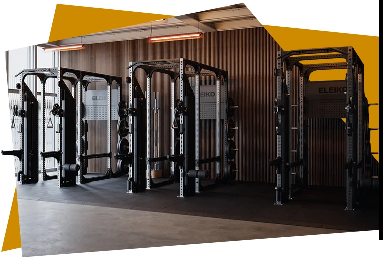 Ardent Fitness technician inspecting an Eleiko Prestera rack during a maintenance visit