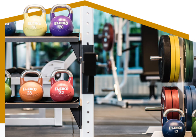 Eleiko freestanding plate rack beside storage integrated into a Prestera rack