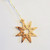 Fair trade wholesale olive wood cutwork star ornament from West Bank
