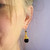 Fair trade onyx and freshwater pearl dangle earrings from Turkey