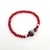 Fair trade plastic beaded stretch bracelet with ceramic highlight bead from Turkey