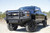 FAB FOURS CH08Q20601 Elite Front Bumper 2 Stage Black Powder Coated w/Full Grill Guard Incl. Light Cut-Outs Elite Front Bumper