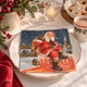 Santa Claus Christmas paper napkins featuring Father Christmas on a snowy chimney with presents and winter village, 33x33cm