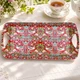 Red William Morris Strawberry Thief melamine sandwich tray with finger sandwiches in a British afternoon tea setting