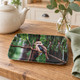 Small kookaburra melamine serving tray, 24 × 16 cm, on a wooden table with eucalyptus foliage