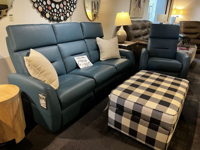Elran dual power, leather match reclining sofa with matching reclining chair