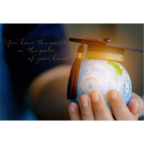 Hand Holding Small Globe with Grad Cap Graduation Congratulations Card: You have the world in the palm of your hand