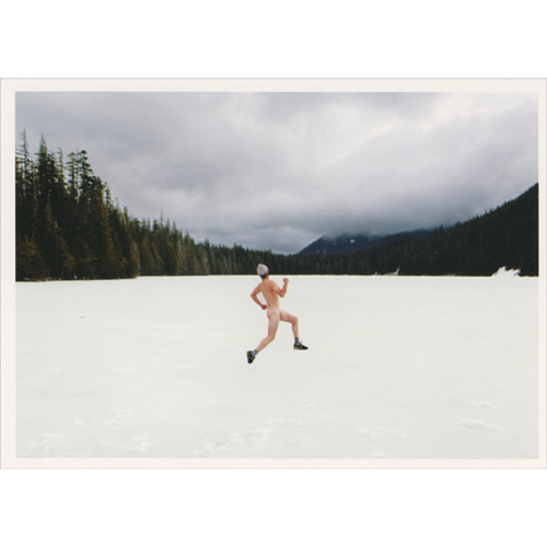 Streaker with Winter Hat Jogging Across Frozen Lake Surrounded by Forest and Hills Humorous / Funny Christmas Card