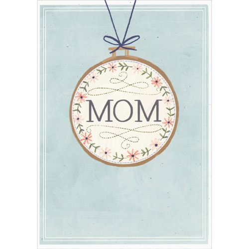 Mom Pendant with Floral Border Hung from Blue String on Light Blue Mother's Day Card: MOM