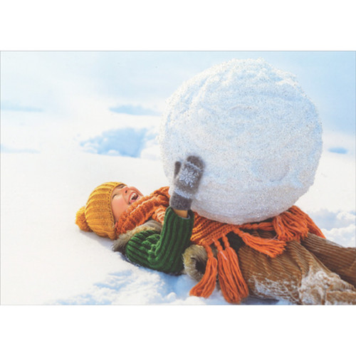 Child Laying on Ground and Holding Giant Snowball Box of 12 Christmas Cards