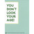 You Don't Look Your Age : White Banner on Blue Funny / Humorous Birthday Card: You Don't Look Your Age! You don't even look the age you claim to be.