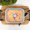 Square write-on labels on freezer meal labeled with cook time and temperature