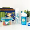 Round write-on labels on baby bottle, kids water bottle and lunch container